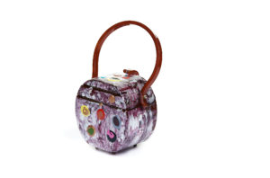 Round Bakelite Purse with ball feet side